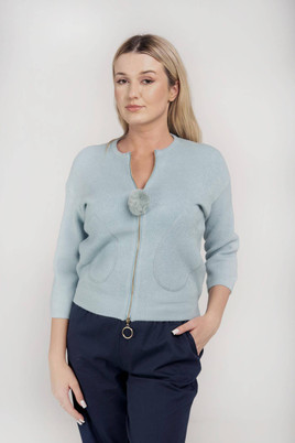 Miętowy sweter zapinany na zamek