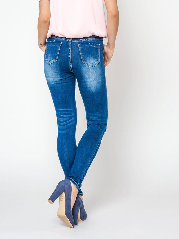 Jeansy zdobione przecięciami i dżetami na kolanach granatowe