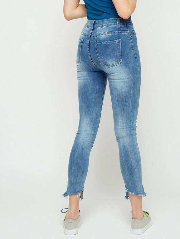 Jeansy zdobione przetarciami i perełkami niebieskie