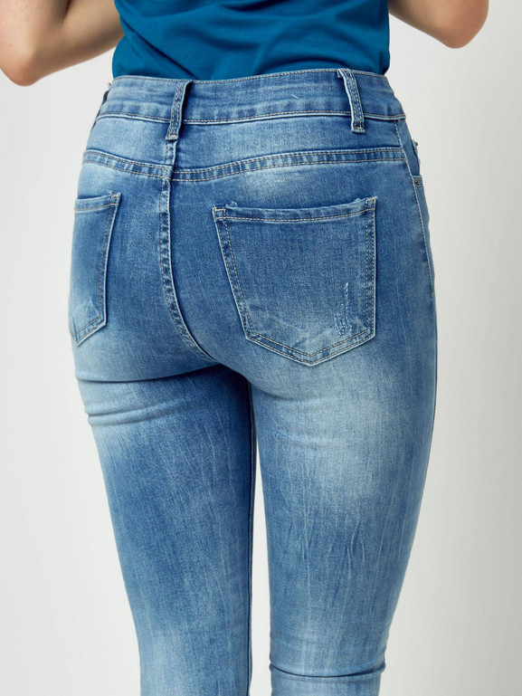 Jeansy zdobione przetarciami i perełkami niebieskie